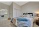 Carpeted bedroom with sliding closet doors is brightly lit at 2852 Red Ct, Las Vegas, NV 89123