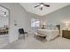 Comfortable main bedroom with ceiling fan and access to en-suite bathroom at 2852 Red Ct, Las Vegas, NV 89123