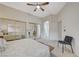 Spacious main bedroom featuring mirrored closet doors and an ensuite bathroom at 2852 Red Ct, Las Vegas, NV 89123