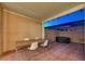 The covered patio has a tiled floor, seating, and an outdoor hot tub for relaxing evenings at 2852 Red Ct, Las Vegas, NV 89123