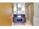 Modern bathroom featuring a vessel sink, wood vanity, and a glass enclosed shower at 3750 Las Vegas Blvd # 2407, Las Vegas, NV 89158