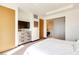 Bright bedroom with adjacent bathroom featuring stainless steel dresser at 3750 Las Vegas Blvd # 2407, Las Vegas, NV 89158