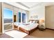 Bright bedroom with a queen bed, and expansive city views through the floor-to-ceiling windows at 3750 Las Vegas Blvd # 2407, Las Vegas, NV 89158
