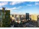 Expansive city views from a high-rise building showcasing hotels and the Las Vegas strip under a blue sky with clouds at 3750 Las Vegas Blvd # 2407, Las Vegas, NV 89158