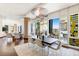 Elegant dining room with modern chandelier, a large wood table, and city views at 3750 Las Vegas Blvd # 2407, Las Vegas, NV 89158