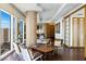 Cozy living room with modern furniture, hardwood floors, and floor-to-ceiling windows showcasing city views at 3750 Las Vegas Blvd # 2407, Las Vegas, NV 89158