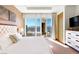 Sun-filled bedroom offers city views from expansive windows and natural light at 3750 Las Vegas Blvd # 2407, Las Vegas, NV 89158