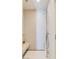 Modern shower area featuring white tile walls, a rain shower head, and built-in bench at 3750 Las Vegas Blvd # 2407, Las Vegas, NV 89158