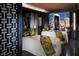 Luxurious spa room with two massage beds, elegant decor, and a window view of the city at 3750 Las Vegas Blvd # 2407, Las Vegas, NV 89158