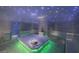 Contemporary spa area featuring a central platform, stone benches, and a unique lighting system at 3750 Las Vegas Blvd # 2407, Las Vegas, NV 89158
