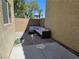 Enclosed backyard patio featuring brick pavers and outdoor sectional seating at 4256 Perfect Drift St, Las Vegas, NV 89129