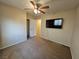 This bedroom features neutral walls, carpet flooring, a closet and a mounted television at 4256 Perfect Drift St, Las Vegas, NV 89129