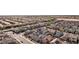From above, a sprawling residential area is seen, showcasing neatly arranged homes and quiet streets in Nevada at 4347 Outlook Vista Ave, North Las Vegas, NV 89084