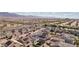 Expansive aerial view of a well-planned community with mountain views and organized streets at 4347 Outlook Vista Ave, North Las Vegas, NV 89084