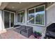 Cozy back patio with outdoor seating, ideal for relaxing and entertaining guests at 4347 Outlook Vista Ave, North Las Vegas, NV 89084