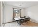 Bright dining area with modern table and chairs, adjacent to sliding glass doors at 4347 Outlook Vista Ave, North Las Vegas, NV 89084