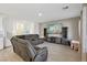Bright living room showcasing a large sectional sofa and entertainment setup at 4347 Outlook Vista Ave, North Las Vegas, NV 89084
