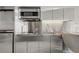 Modern kitchenette with stainless steel appliances, sleek cabinets, and functional design at 4381 W Flamingo Rd # 27308, Las Vegas, NV 89103