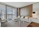 Stylish living room with city views, a modern sofa, and comfortable seating area at 4381 W Flamingo Rd # 27308, Las Vegas, NV 89103