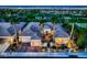 Stunning aerial view of home and landscaping, showcasing desert landscaping and golf course views with the Las Vegas strip in the background at 4564 Bersaglio St, Las Vegas, NV 89135