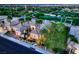 Stunning aerial view of a luxury home overlooking a lush golf course and city skyline at 4564 Bersaglio St, Las Vegas, NV 89135