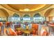 Spacious clubhouse interior with abundant natural light, comfortable seating, and elegant decor at 4564 Bersaglio St, Las Vegas, NV 89135