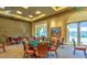 Inviting game room with poker tables, comfortable seating, and scenic views at 4564 Bersaglio St, Las Vegas, NV 89135