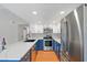 Modern kitchen features stainless steel appliances and two-tone cabinetry at 5060 Jeffreys St # 201, Las Vegas, NV 89119