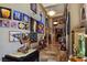 Open foyer featuring high ceilings, travertine floors, sculptures, and artwork at 5416 Alabaster Ct, Las Vegas, NV 89149