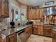 Gourmet kitchen features stainless steel appliances and granite countertops, providing ample counter space at 5416 Alabaster Ct, Las Vegas, NV 89149