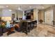Spacious living room with custom cabinets, fireplace, and comfortable leather seating area at 5416 Alabaster Ct, Las Vegas, NV 89149