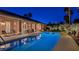 Sparkling pool reflects the home's architecture; an ideal space for relaxation and enjoyment at 5416 Alabaster Ct, Las Vegas, NV 89149