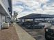 Complex parking area with covered parking featuring plenty of spaces at 5419 Centurion Ct # 102, Las Vegas, NV 89122