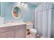Bathroom featuring a marble vanity, toilet, and shower with curtain, perfect for everyday use at 5532 Sentinel Bridge St, Las Vegas, NV 89130