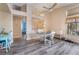 Bright dining area with wood-look floors, recessed lighting, and views to kitchen at 5532 Sentinel Bridge St, Las Vegas, NV 89130