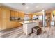 Stylish kitchen island featuring granite countertops, stainless steel appliances, and wood cabinetry at 5532 Sentinel Bridge St, Las Vegas, NV 89130