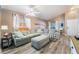 Cozy living room featuring comfortable seating, vaulted ceilings, and natural light at 5532 Sentinel Bridge St, Las Vegas, NV 89130