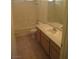 Bathroom featuring a vanity with cabinets and a shower/tub combination at 600 Sarajane Ln, Las Vegas, NV 89107