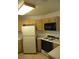 Kitchen featuring ample cabinet space and a full suite of appliances at 600 Sarajane Ln, Las Vegas, NV 89107