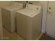 Laundry room with appliances and tile flooring at 600 Sarajane Ln, Las Vegas, NV 89107