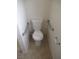 Toilet alcove features grab bars for added safety and accessibility at 600 Sarajane Ln, Las Vegas, NV 89107