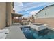 Backyard with covered patio, built-in BBQ, spa and pool, perfect for outdoor entertaining at 6142 W Levi Ave, Las Vegas, NV 89141