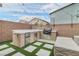 Backyard features outdoor kitchen and patio at 6142 W Levi Ave, Las Vegas, NV 89141