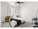 Clean bedroom featuring a platform bed, a large window and lots of bright natural light at 6142 W Levi Ave, Las Vegas, NV 89141