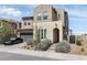 Charming two-story home featuring a stucco facade, well-maintained landscaping, and a two-car garage at 6142 W Levi Ave, Las Vegas, NV 89141