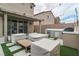 Outdoor kitchen with seating and built-in grill, perfect for backyard entertaining at 6142 W Levi Ave, Las Vegas, NV 89141