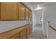 Hallway features custom cabinetry that provides ample storage space at 6407 Wild Strawberry Ln, Las Vegas, NV 89142