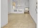 Spacious Living Room features tile flooring with high ceilings at 6407 Wild Strawberry Ln, Las Vegas, NV 89142