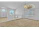 Open living area with large windows providing ample natural light at 6407 Wild Strawberry Ln, Las Vegas, NV 89142