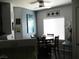 Cozy dining area featuring modern decor, stylish lighting, and a serene ambiance for enjoyable meals at 6480 Annie Oakley Dr # 111, Las Vegas, NV 89120